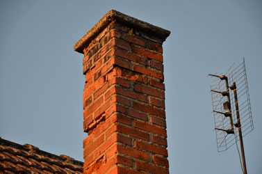 Damaged Chimney on the roof causing water leaks